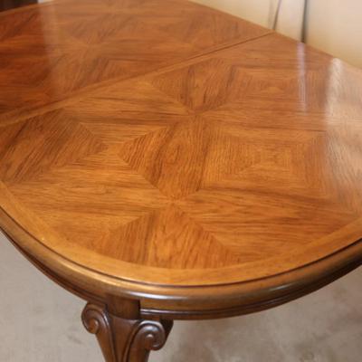 Solid Wood Dining Table with Two Leaves