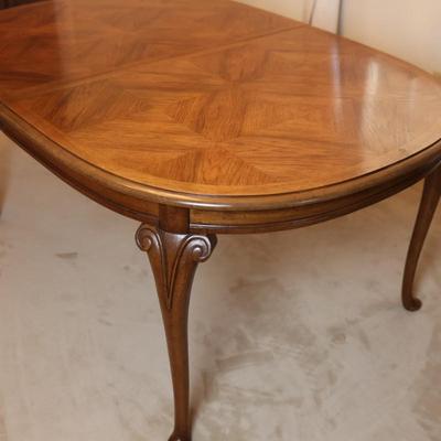 Solid Wood Dining Table with Two Leaves