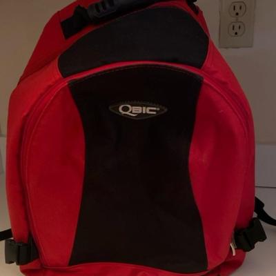 Marmot backpack, a Qbic backpack, AARP gym bag and an Asheville Trail Guide!