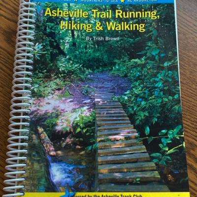 Marmot backpack, a Qbic backpack, AARP gym bag and an Asheville Trail Guide!
