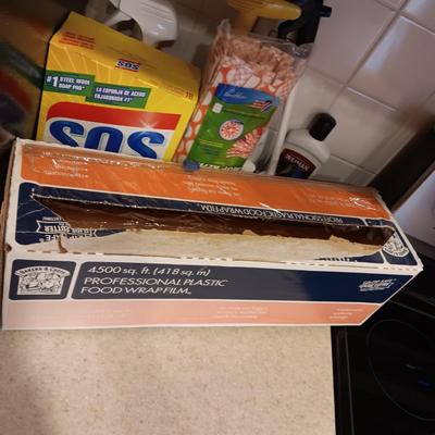 CLEANING PRODUCTS, LARGE ROLL OF PLASTIC WRAP AND BROOM WITH DUST PAN