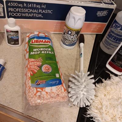 CLEANING PRODUCTS, LARGE ROLL OF PLASTIC WRAP AND BROOM WITH DUST PAN