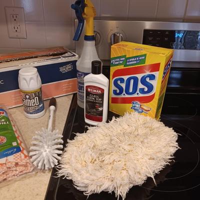 CLEANING PRODUCTS, LARGE ROLL OF PLASTIC WRAP AND BROOM WITH DUST PAN