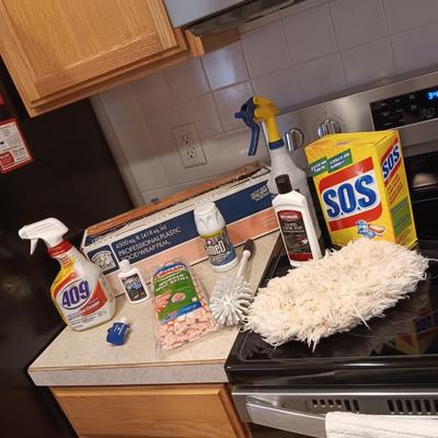 CLEANING PRODUCTS, LARGE ROLL OF PLASTIC WRAP AND BROOM WITH DUST PAN