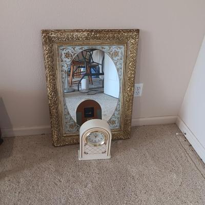 ELGIN CLOCK AND A PLASTIC FRAMED WALL MIRROR