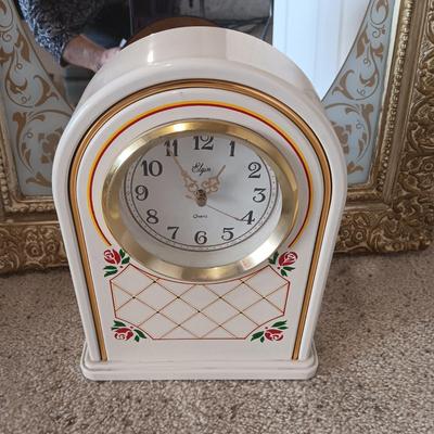 ELGIN CLOCK AND A PLASTIC FRAMED WALL MIRROR