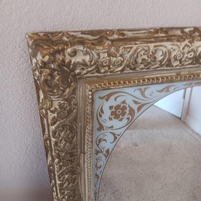 ELGIN CLOCK AND A PLASTIC FRAMED WALL MIRROR