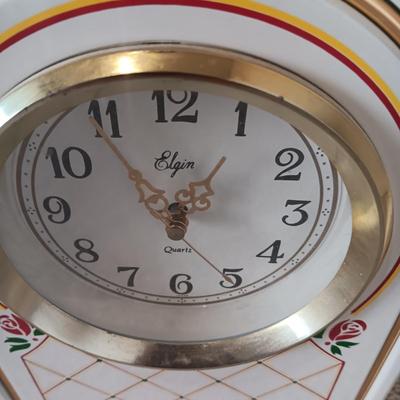 ELGIN CLOCK AND A PLASTIC FRAMED WALL MIRROR