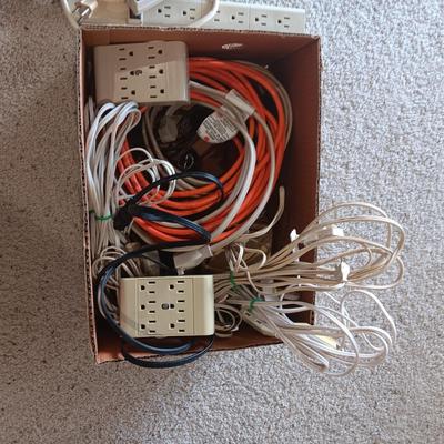 AN ASSORTMENT OF ELECTRICAL CORDS
