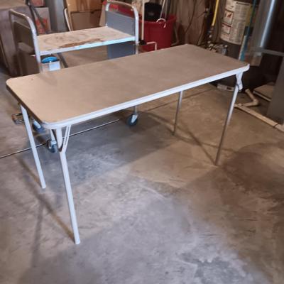 2 TIER LIBRARY CART ON WHEELS AND A 4 FOOT FOLDING TABLE