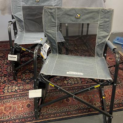 Pair of Rocker Chairs with Tags with A Shelf Too  