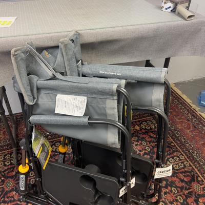 Pair of Rocker Chairs with Tags with A Shelf Too  