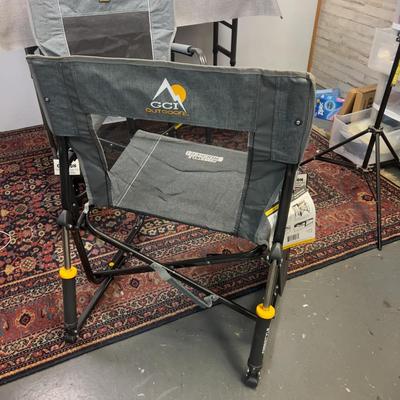 Pair of Rocker Chairs with Tags with A Shelf Too  