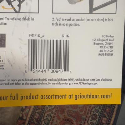 Pair of Rocker Chairs with Tags with A Shelf Too  