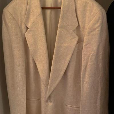 You'll be looking dapper in this beige woven silk sportscoat!