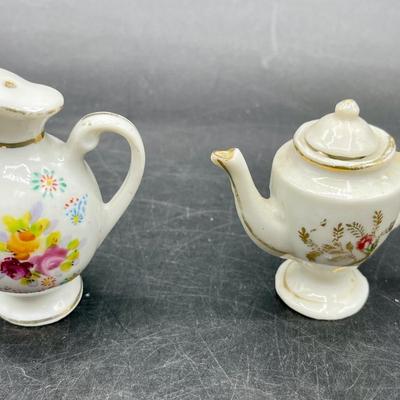 Assorted Ceramic Miniature Lot - 2 teacup/saucers, Chair, Salt Pepper Pitcher, Tea pot with lid