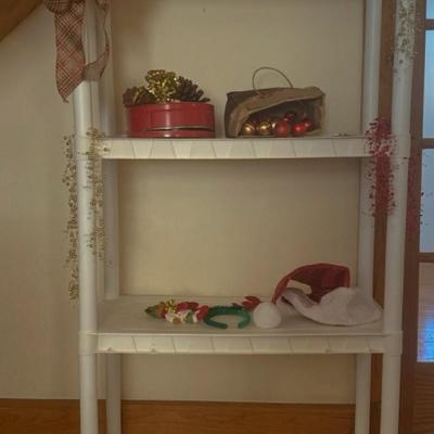 Assorted Christmas Decorations and Pull Apart Plastic Shelves