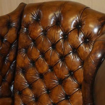 PAIR OF BROWN LEATHER THOMAS CHIPPENDALE CHESTERFIELD TUFTED WINGBACK ARMCHAIRS