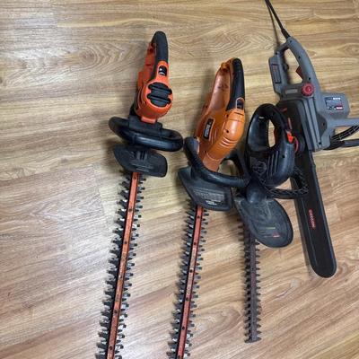 Chain saw and 3 Hedge Trimmers