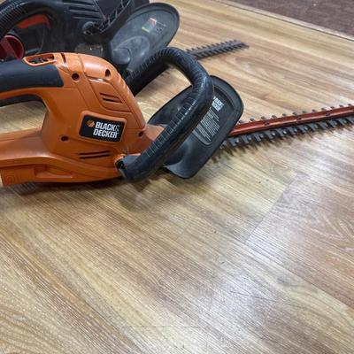 Chain saw and 3 Hedge Trimmers