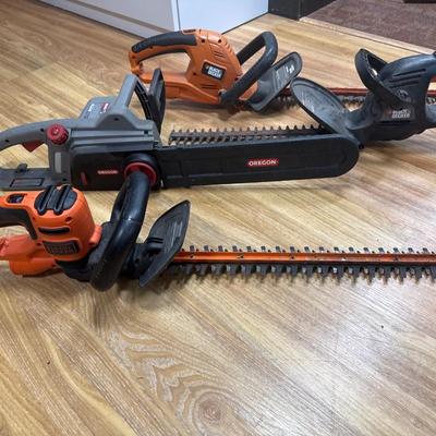 Chain saw and 3 Hedge Trimmers