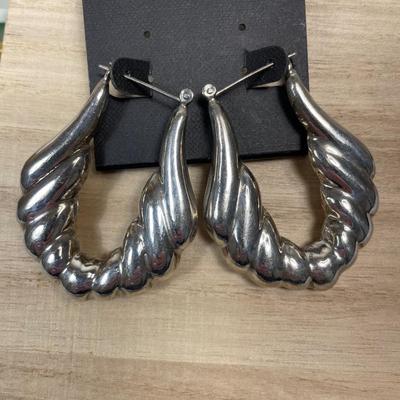 Large silver tone hoops