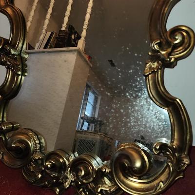 Large gold framed mirror