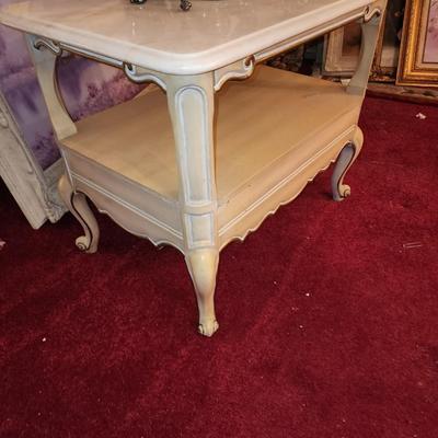 Pair of marble top end tables.