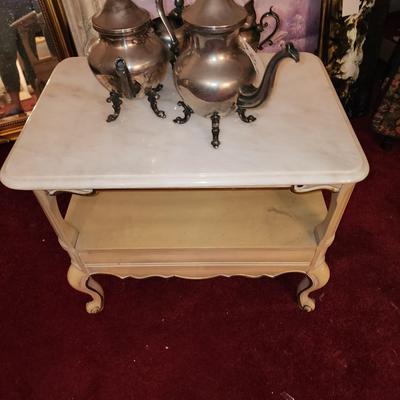 Pair of marble top end tables.