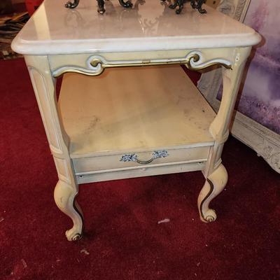 Pair of marble top end tables.