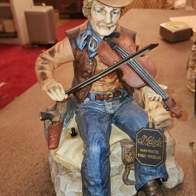 Melody in motion figurine.