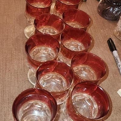 Set of 12 Cranberry glass mini goblets.