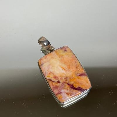 Lion’s Paw shell and sterling silver pendant