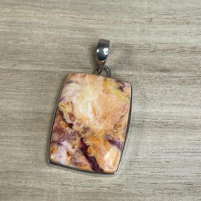 Lion’s Paw shell and sterling silver pendant