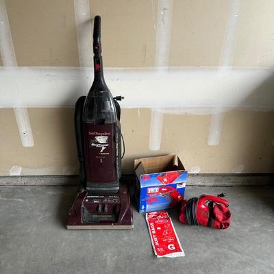 ULTRA DIRT DEVIL AND A HOOVER WINDTUNNEL VACUUMS