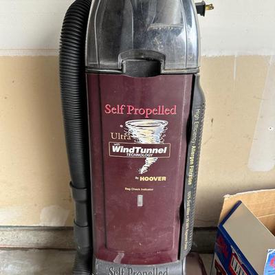 ULTRA DIRT DEVIL AND A HOOVER WINDTUNNEL VACUUMS