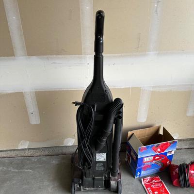 ULTRA DIRT DEVIL AND A HOOVER WINDTUNNEL VACUUMS