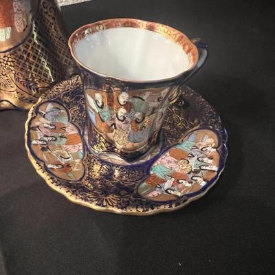 Tea pot and cup and saucer