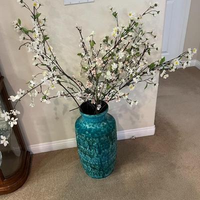 Blue vase with flowers