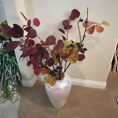 Vase with leaves