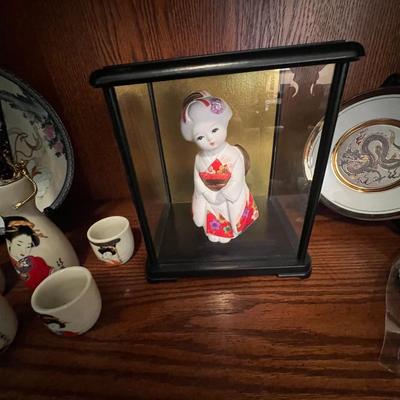Collector plates, doll and more