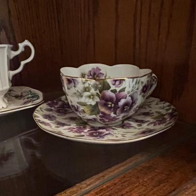 9 cups and saucers