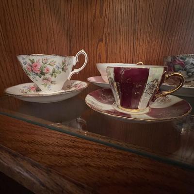 9 cups and saucers