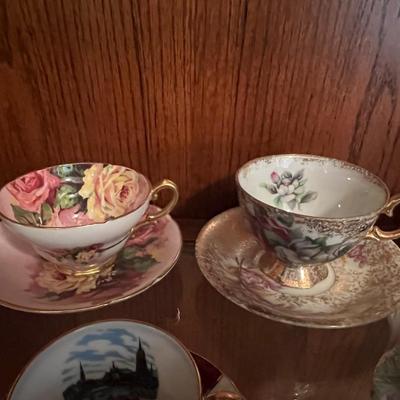 9 cups and saucers