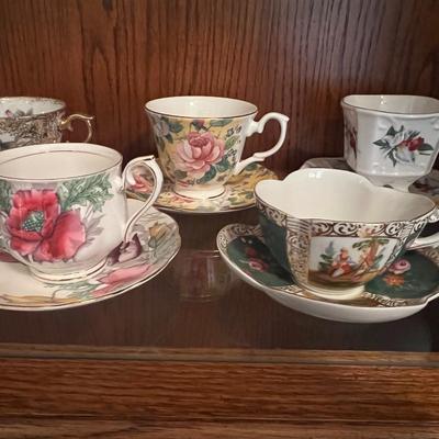 9 cups and saucers