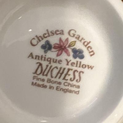 9 cups and saucers