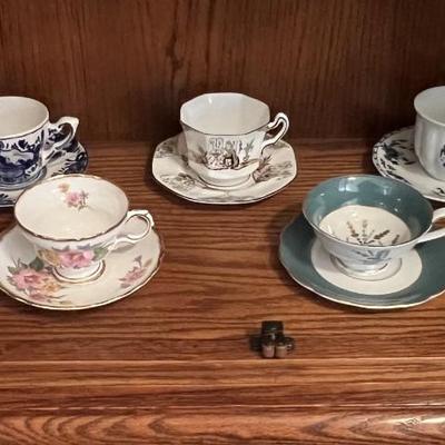 7 cups and saucers