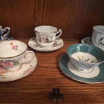 7 cups and saucers