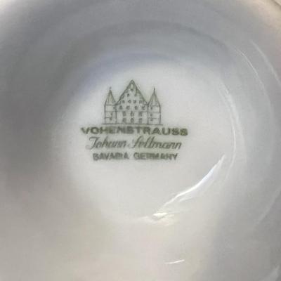7 cups and saucers