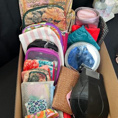 Box of makeup bags, mirrors